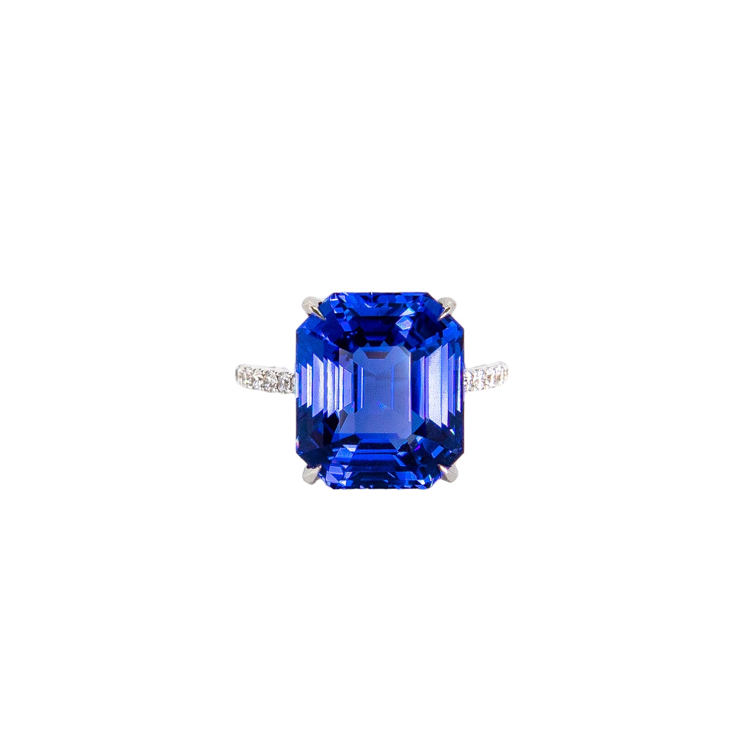 Emerald cut blue sapphire and diamond ring. Fine pave diamond band and 12 carat blue sapphire by Valentina Fine Jewellery.