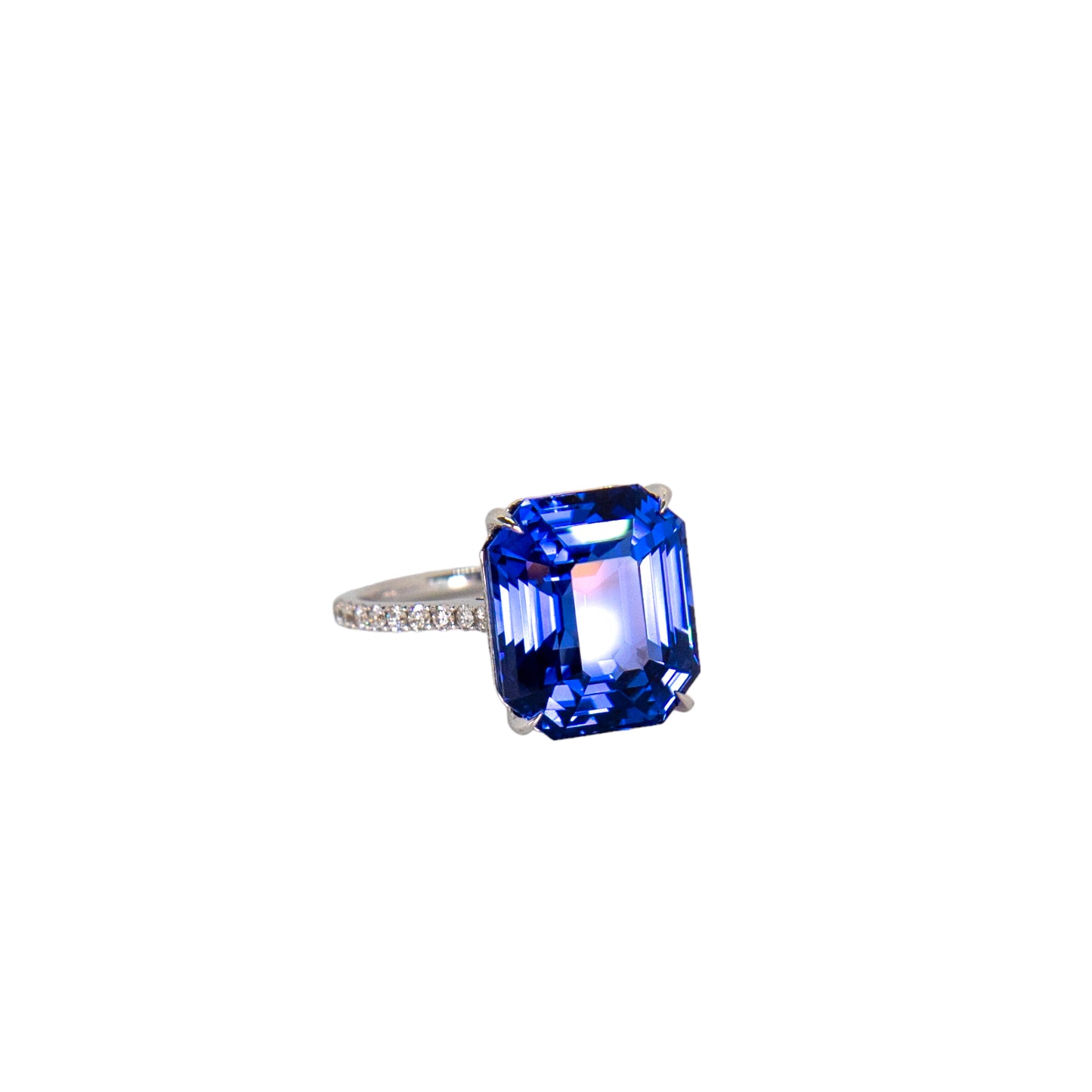 Emerald cut sapphire and diamond ring