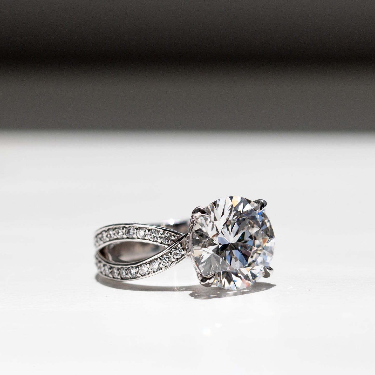 Big bow statement diamond engagement ring in platinum or 18k gold with pave bands by Valentina Fine Jewellery Hong Kong. Global free shipping including USA, Australia, Singapore, China and Taiwan