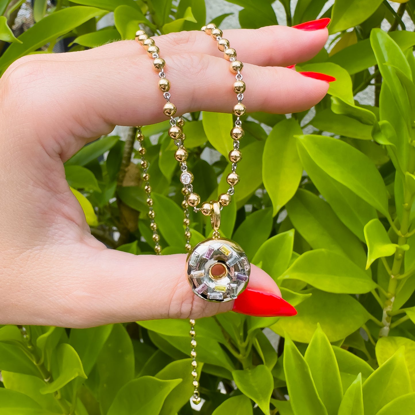18k gold and platinum doughnut pendant with no heat rainbow pastel sapphires by Valentina Fine Jewellery Hong Kong, free global delivery including USA. Yummy donut charm!