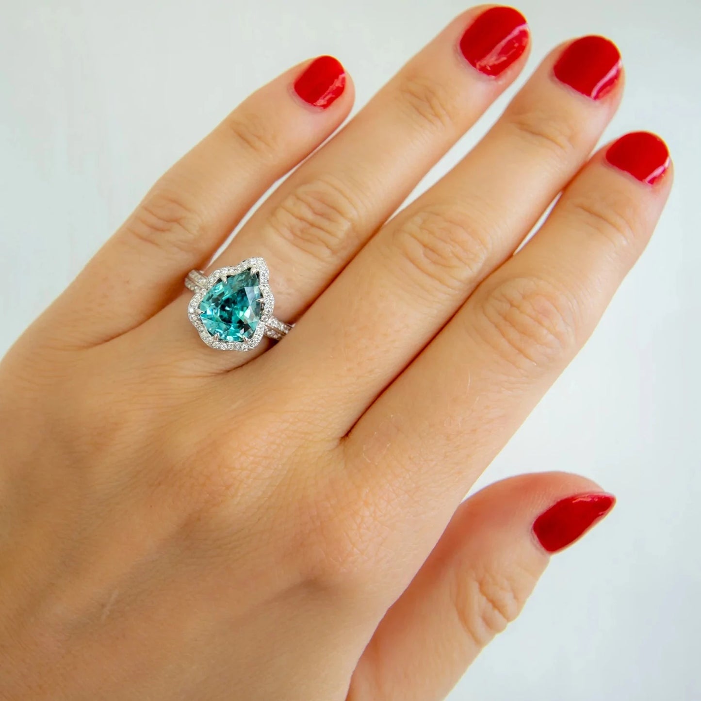 Pear cut zircon and diamond ring