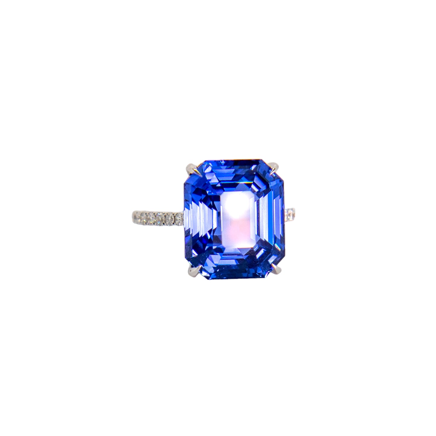 Emerald cut sapphire and diamond ring