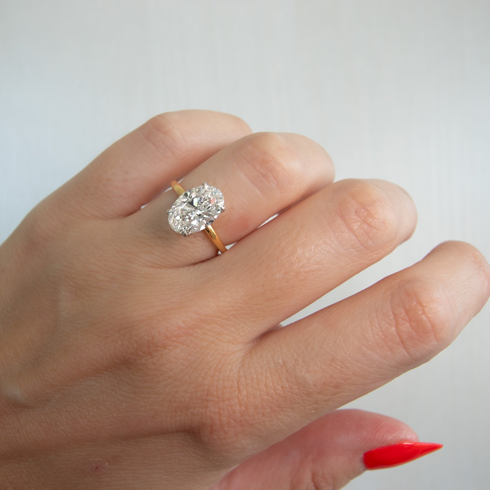 Oval Cut Diamond Engagement Ring with Hidden Halo