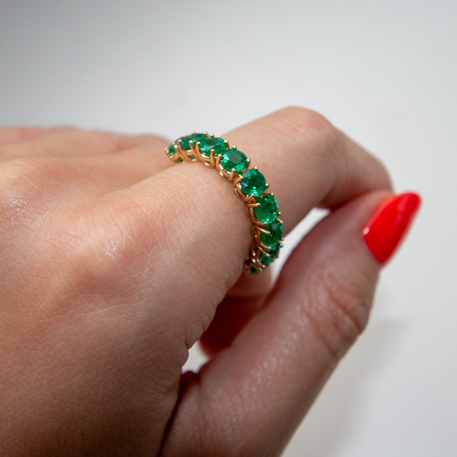 3 carat green emerald eternity ring in 18k yellow gold by Valentina Fine Jewellery Hong Kong. Global free delivery including USA, UK, Singapore, Dubai and Australia 