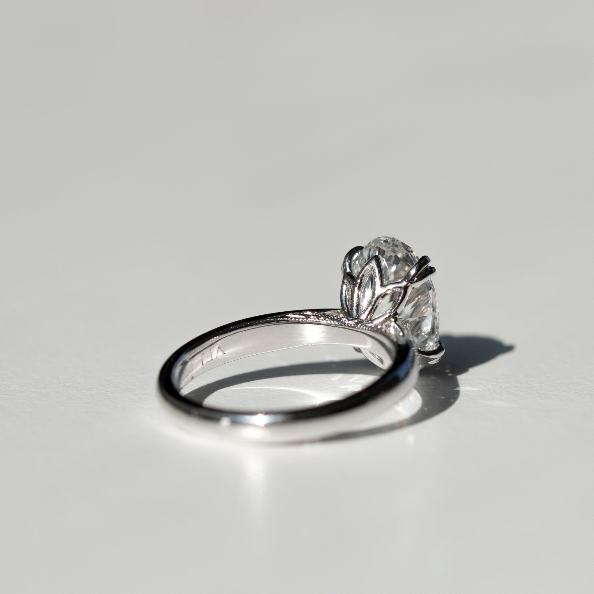 Tulip diamond engagement ring with floral diamond setting by Valentina Fine Jewellery Hong Kong. Hand engraved ring. Global free shipping including USA UK Dubai Singapore Taiwan and Australia. 