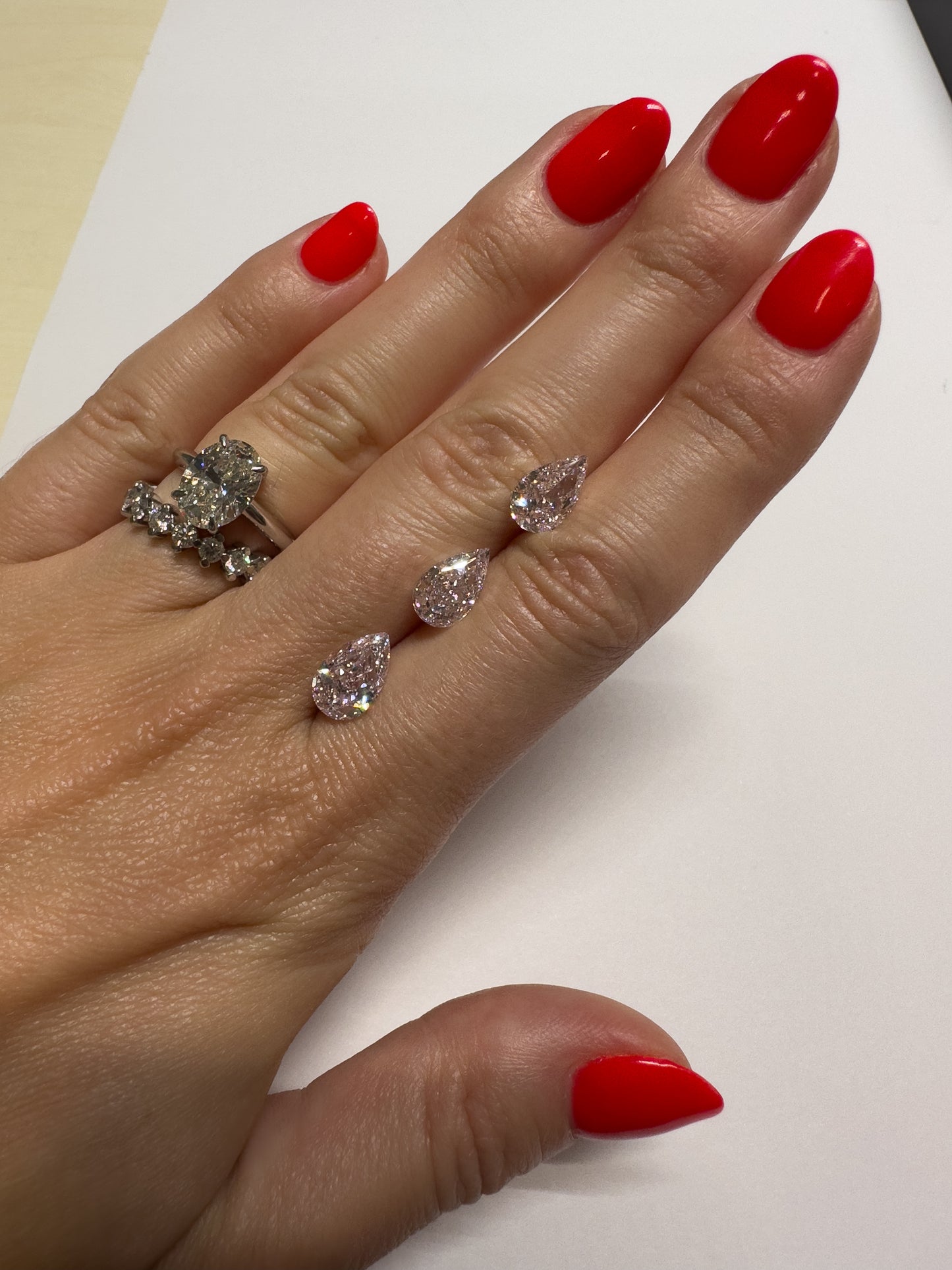 Pink diamond engagement ring, pink pear cut diamonds Hong Kong USA Australia UK