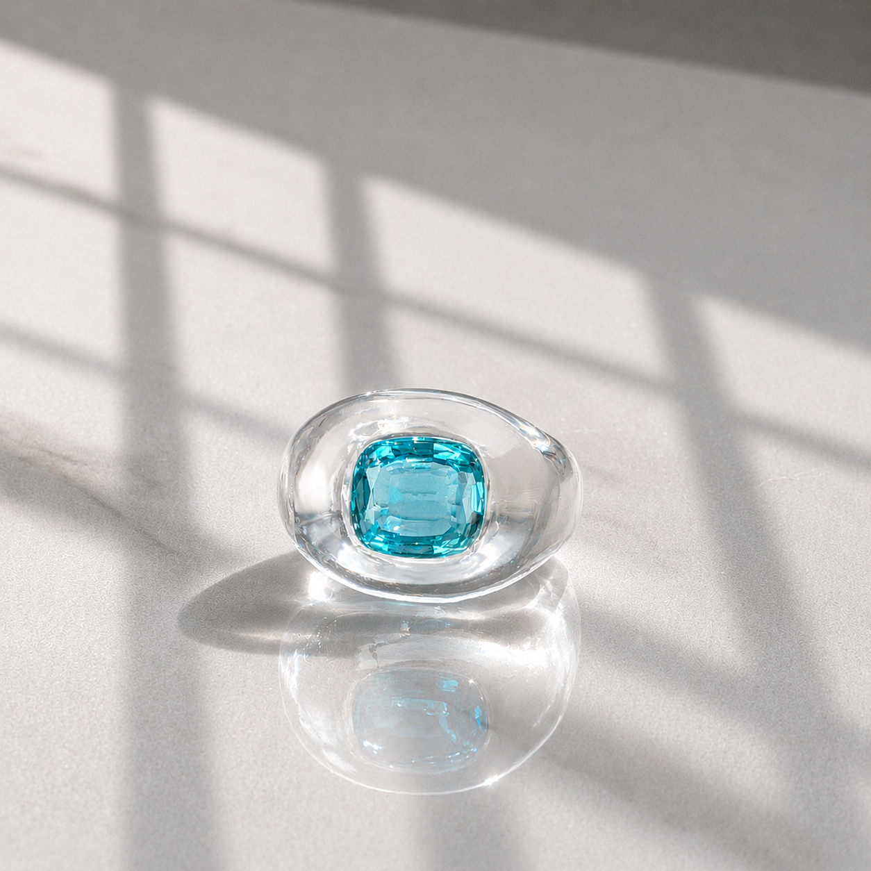 Liquid Ice: clear lucite and gemstone ring with a blue stone hand carved by Anastasia at Valentina Fine Jewellery Hong Kong. Global free shipping including USA, Canada, Australia, UK and Singapore