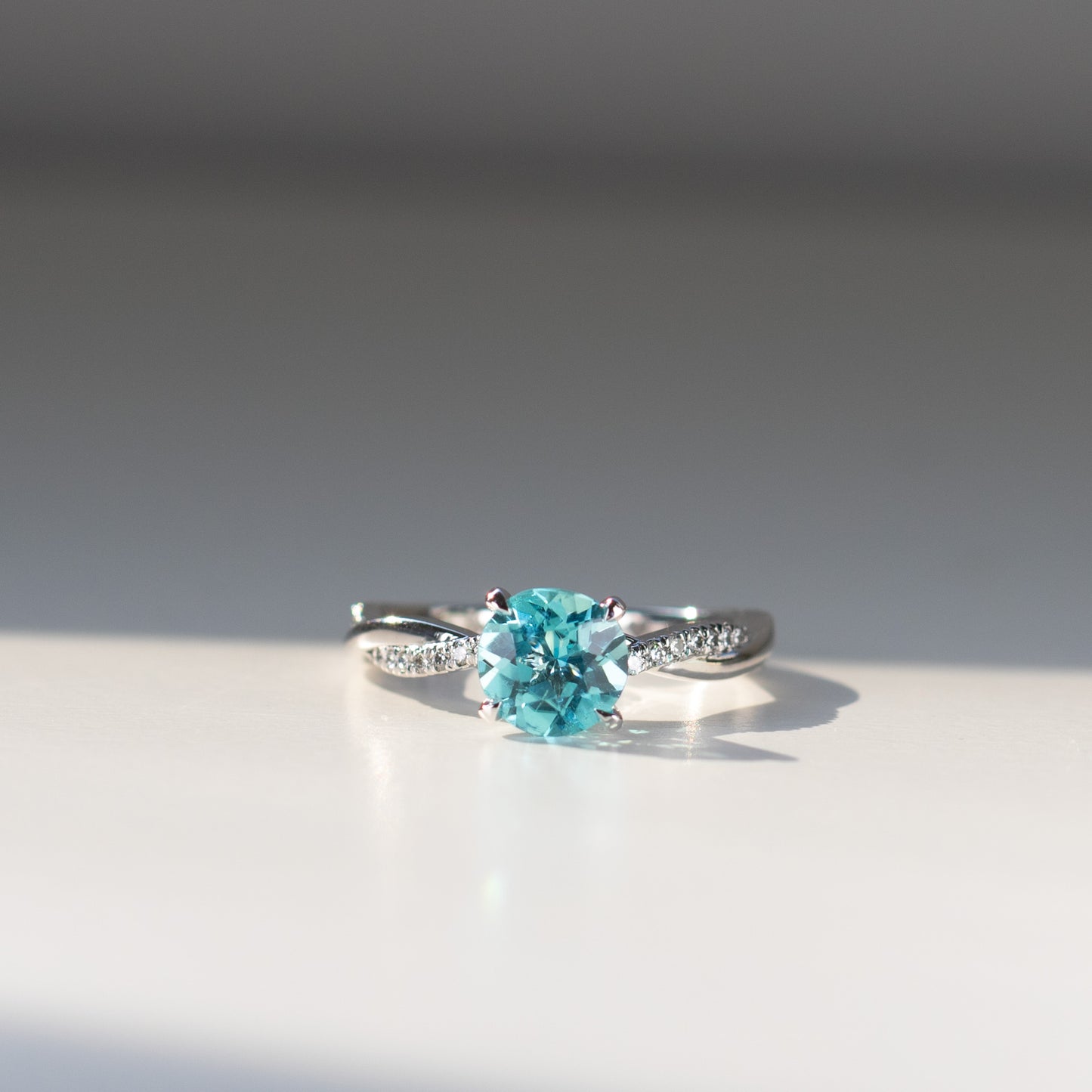 Natural paraiba tourmaline and diamond bespoke engagement ring in gold or platinum by Valentina Fine Jewellery Hong Kong. Global free shipping to USA Australia Singapore China and UAE.