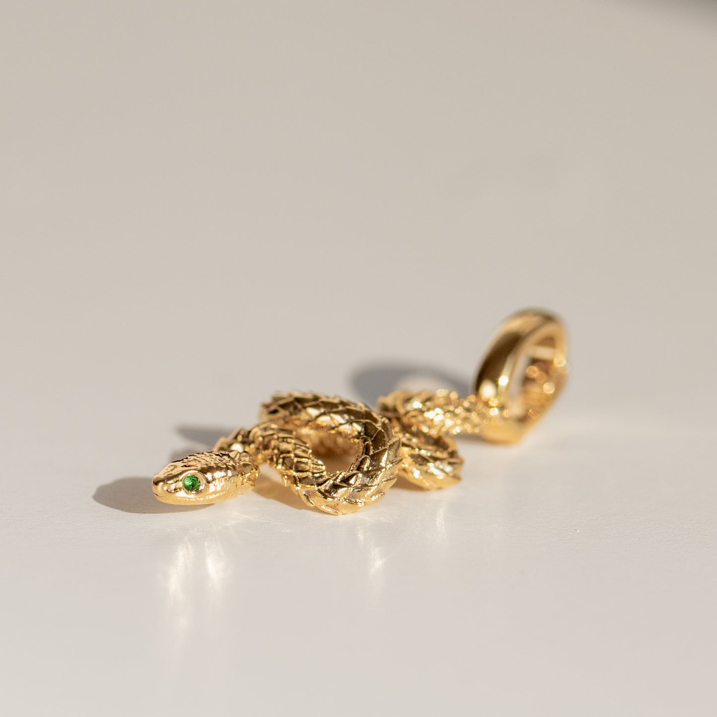 Snake charm pendant in 18k yellow gold by Valentina Fine Jewellery Hong Kong. Free global delivery including USA, UK, Singapore & Australia. 