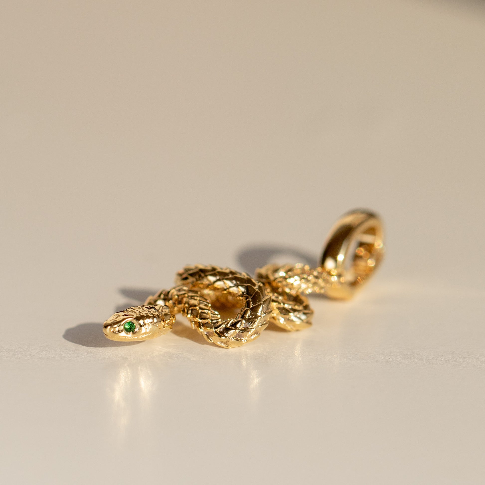 Snake charm pendant in 18k yellow gold by Valentina Fine Jewellery Hong Kong. Free global delivery including USA, UK, Singapore & Australia. 