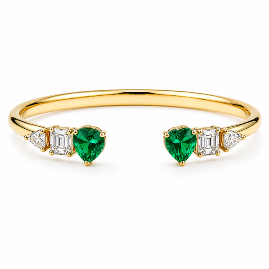 Heart shape emerald and diamond open torque bracelet in 18k yellow gold by Valentina Fine Jewellery Hong Kong. Free shipping to USA Singapore China and UK