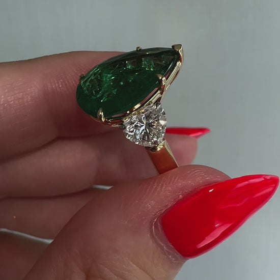 Huge 5.65ct green pear cut emerald ring with heart shape diamonds in 18k gold by Valentina Fine Jewellery Hong Kong. Free global shipping including USA