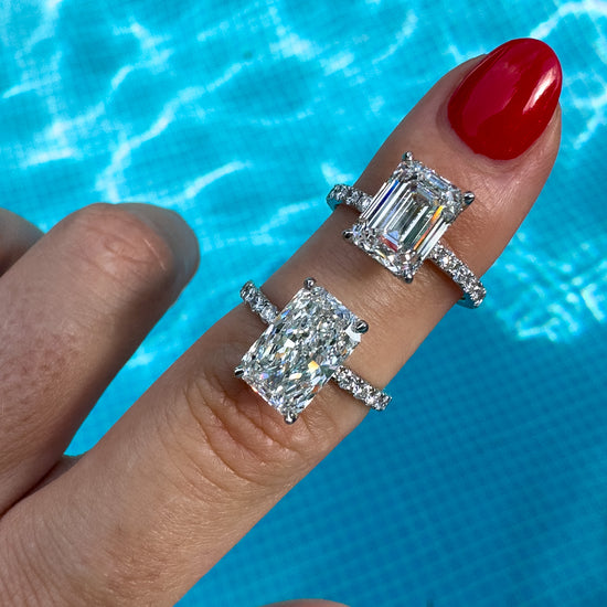 3 carat emerald cut diamond engagement ring with diamond pave on the band. Thin ring makes the diamond stand out. By Valentina Fine Jewellery Hong Kong USA. Free international shipping on all orders.