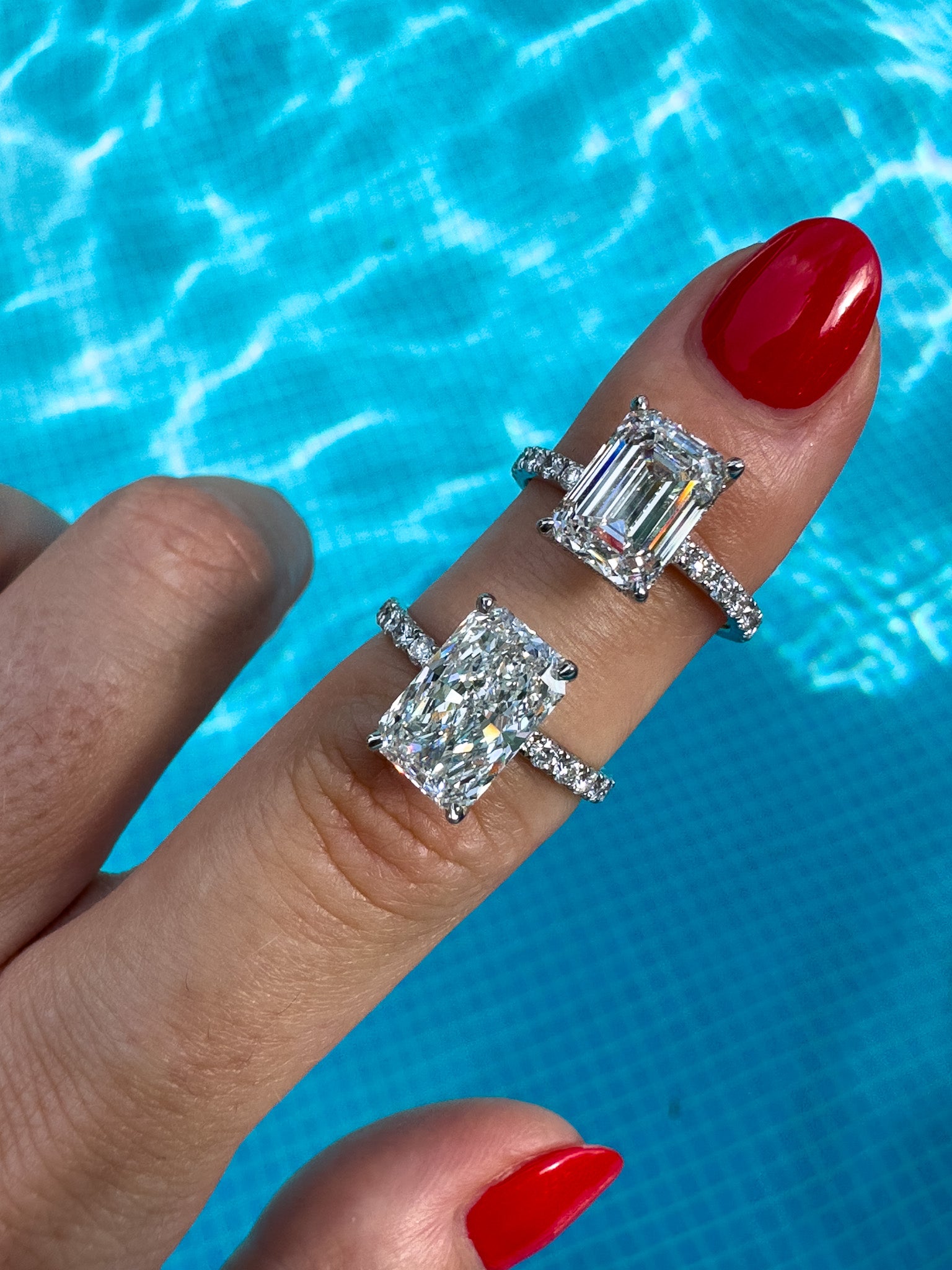 3 carat emerald cut diamond engagement ring with diamond pave on the band. Thin ring makes the diamond stand out. By Valentina Fine Jewellery Hong Kong USA. Free international shipping on all orders.