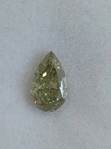 Rare chameleon diamond for bespoke custom engagement ring Hong Kong. Global free shipping to USA Australia Canada and Singapore
