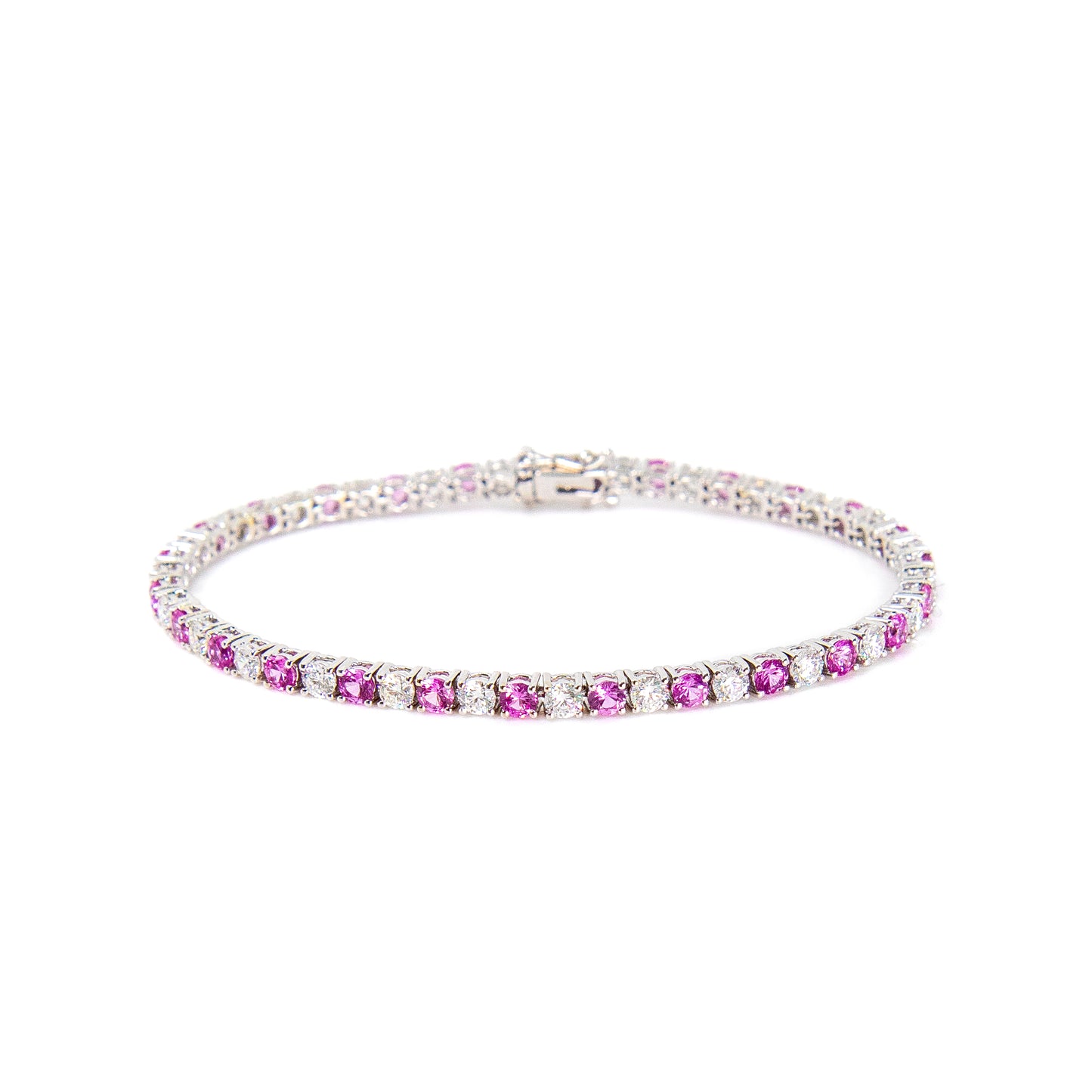 Diamond and pink sapphire tennis bracelet